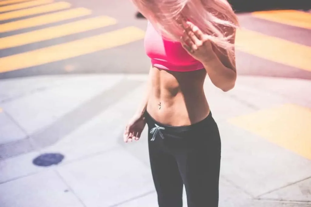 Woman with toned stomach after LA-EMS Body Sculpting Treatment Bovingdon